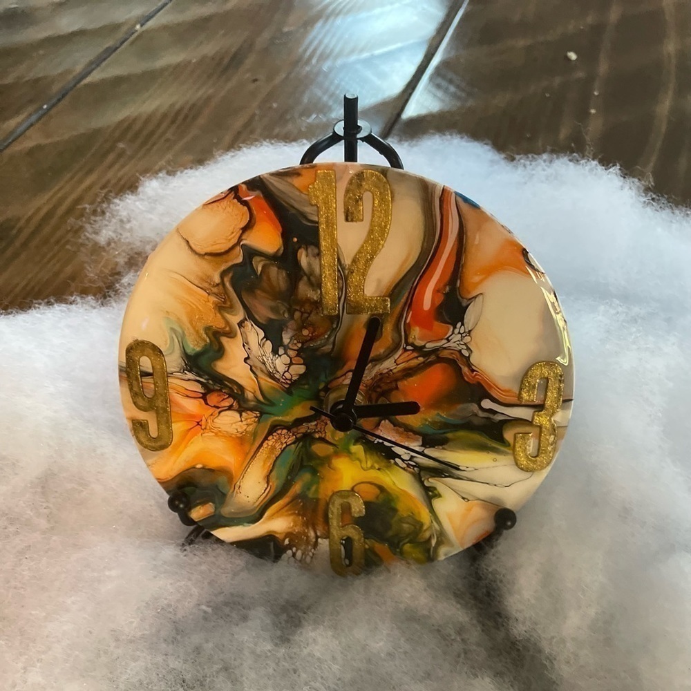 5 1/2” clock w/stand hand painted acrylic; sealed w/resin on old Victrola record